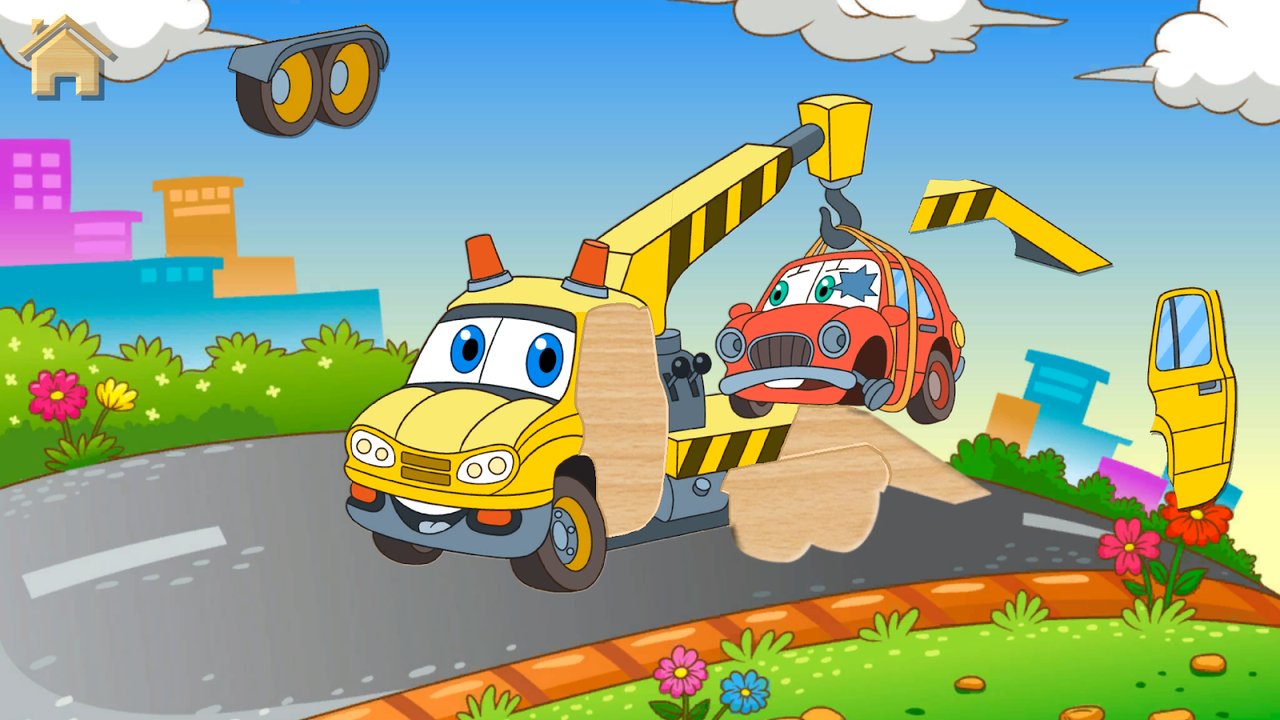 Puzzle d’une dépanneuse transportant une voiture